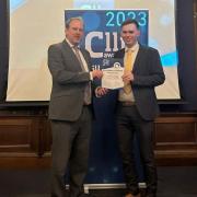 Cllr Lunday collecting his certificate with Jonathan Carr-West the CEO of LGIU
