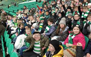 Having a ball: The children cheered their favourite players on