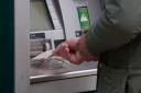 Dwindling number of cash machines sparks concerns over ‘digital divide’