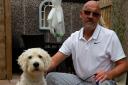 Peter Paterson feared his labradoodle Dougal would be killed as it was attacked by another dog