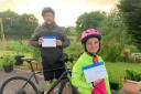 St Thomas’ Primary pupil Ava Montgomery and her dad Scott have been distributing test kits in Neilston