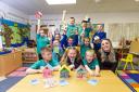 Youngsters at Hillview Primary School show off the colourful bird boxes they designed as part of a fun competition organised by housebuilder Taylor Wimpey
