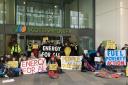 Activists protest in  Scottish Power over rising energy bills