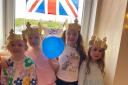 Children wore crowns at the coronation party
