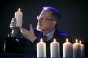 Holocaust survivor, Martin Stern, lights the candles to mark Holocaust Memorial Day
