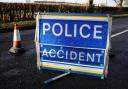 Woman cut from car and man arrested after two-vehicle smash