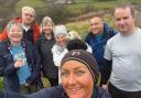 Anwar, second from right, is leading the Neilston Well Walks