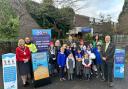Provost Mary Montague, Councillor Colm Merrick, staff from East Renfrewshire Council and staff and pupils from Braidbar Primary