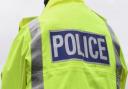 Police warn of road closures following crash near shops