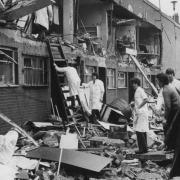 A gas blast flattened a row of shops on Thursday, October 21, 1971