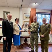 Proud parents Stephen and Cathy Timmins were joined by Major Walter Kerr and Brigadier (retired) Chris Murray as the new trophy was unveiled
