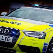 Driver arrested after being caught 'slumped' at the wheel