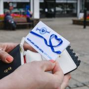 Thousands of cash-strapped East Renfrewshire households will receive £100 gift cards this month