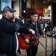 Connor Johnston and Adam Mcleish perform at the Busk Stop