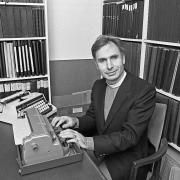 Robert Hetherington in his study with his braille typewriter