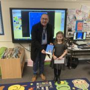 O’Kane with Eve Lavety whose snowman design was the winning entry