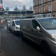 Vans illegally parked on Mearns Rd (Clarkston) taxi rank