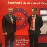 Jackson Carlaw MSP pictured with a British Heart Foundation representative attached