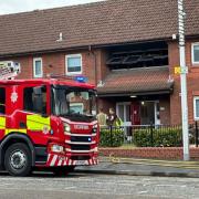 Woman dies after fire breaks out at property