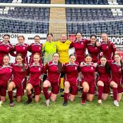 Young footballers win praise after historic match at Hampden