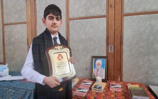 Himmat Khurmi with his achievement award from the Shivcharan Gill Memorial Trust