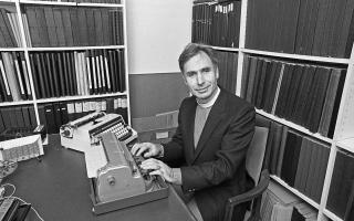 Robert Hetherington in his study with his braille typewriter