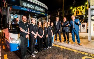 McGill's owners with Garage staff in Glasgow