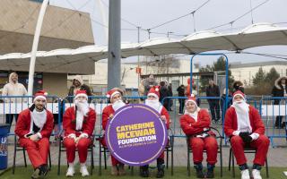 In Pictures: Daredevil Santas tackle bungee jump for a number of charities