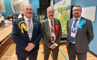 Tony Buchanan (left) with Labour's Owen O'Donnell (centre) and Andrew Morrison, of the Conservatives, at the election count